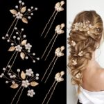 Close-up of 7 gold leaf and pearl wedding hair pins, showcasing intricate details and varying styles.