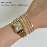 Six 14K gold plated bracelets, including herringbone, Cuban, and paperclip chains, displayed together.