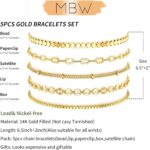 Close-up of MBW Dainty Gold Layering Bracelet Set, showing a mix of thin chains and small beads on a wrist.