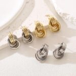 Spiritlele 14K gold and silver tone knot heart link drop dangle earrings with a chunky design for women.
