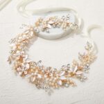 Close-up of a gold SWEETV bridal headband featuring delicate flower and leaf designs with pearls and rhinestones.