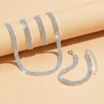 Close-up of a Tatibana Crystal Wedding Jewelry Set featuring a silver necklace and matching earrings with sparkling crystals.