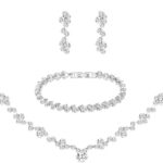 Close-up of a silver-plated necklace and matching earrings adorned with clear round rhinestones, presented in a gift box.